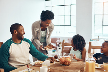 Image showing Who said breakfast cant be fun. a family having breakfast together at home.