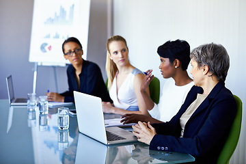 Image showing Afternoon strategizing. a group of coworkers having a meeting in the boardroom.