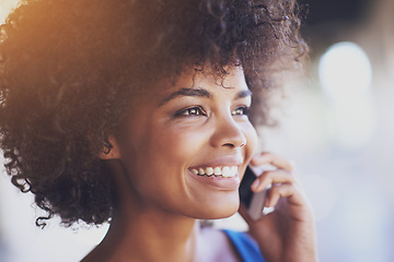 Image showing Happiness is getting a call from your favorite person. A beautiful young woman looking at the camera.