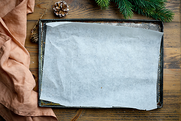 Image showing empty baking pan with paper sheet