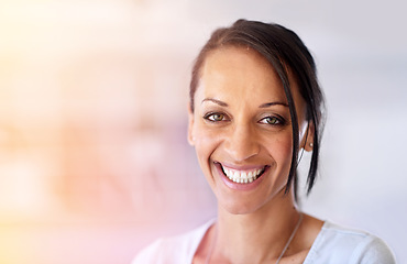 Image showing Shes got the right attitude for a successful career. Portrait of a happy woman in a casual office environment.