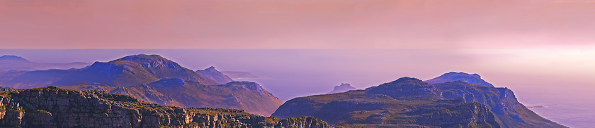 Image showing Scencic sunset seen from Table Mountain. A view from Table Mountain at sunset.