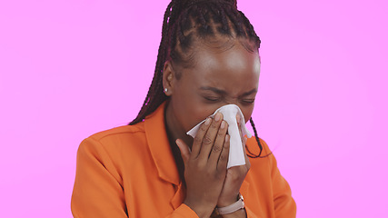 Image showing Black woman, blowing nose and sick with allergies, sneezing and sinus infection with health on pink background. Hay fever, wellness and toilet paper, medical condition with illness or virus in studio