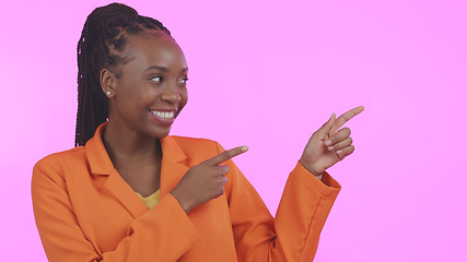 Image showing Black woman, pointing and advertising presentation with information or news, smile with presenter on pink background. Mockup, launch announcement with marketing ads and coming soon in a studio