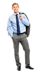 Image showing You have to dress as if youre successful already. Full length shot of a handsome young businessman standing alone in the studio and posing.