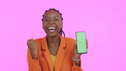 Image showing Woman, excited and phone green screen for success, celebration and wow for news of bonus or competition in studio. Portrait of African winner with mobile mockup, yes and winning on a pink background