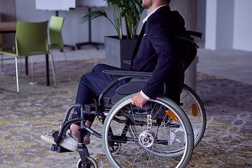 Image showing Closeup photo of a businessman in a wheelchair