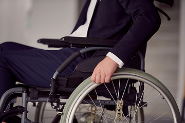 Image showing Closeup photo of a businessman in a wheelchair