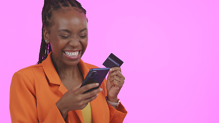 Image showing Business woman, phone and credit card for online shopping, e commerce sale or fintech payment in studio. Excited African person or winner for mobile banking, transaction or order on a pink background