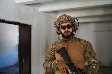 Image showing Modern warfare soldier portrait in urban environment