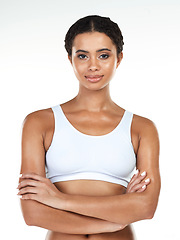 Image showing Confidence should be part of who you are. Portrait of an attractive young woman posing against a white background.