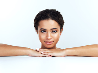 Image showing I have been waiting for you here. Portrait of an attractive young woman posing against a white background.