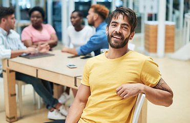 Image showing Nobody optimises the business project like a project manager. a young businessman having a meeting with his team in a modern office.