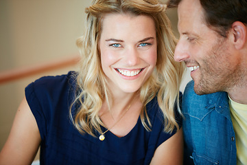 Image showing Love and happiness. Portrait of a happy young couple relaxing together at home.