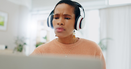 Image showing Woman, headphones and frustrated with laptop for remote work from home for confused thinking, error and mistake. African freelancer girl, computer and listen with fail, 404 glitch and stress in house