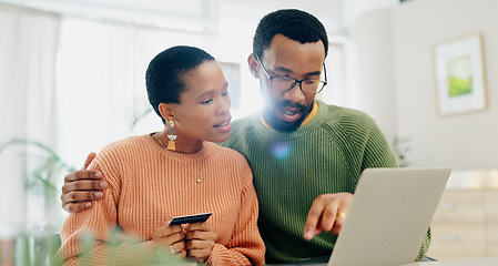 Image showing Payment, credit card and a black couple with a laptop for online shopping, banking or search on website. Ecommerce, house and an African man and woman reading information to pay from an email