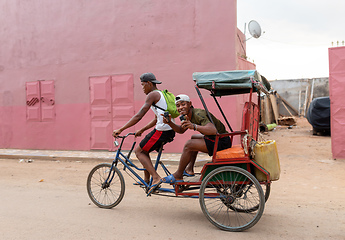 Image showing Traditional rickshaw on the city streets. Rickshaws are a common mode of transport in Madagascar.