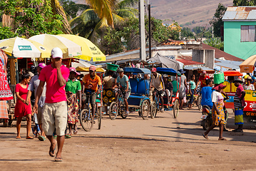 Image showing Traditional rickshaw on the city streets. Rickshaws are a common mode of transport in Madagascar.