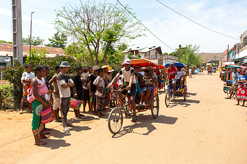 Image showing Traditional rickshaw on the city streets. Rickshaws are a common mode of transport in Madagascar.