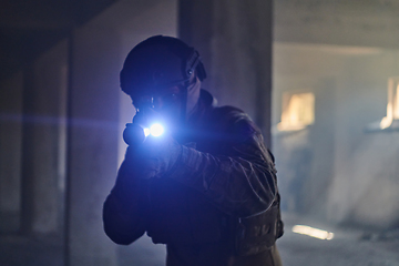 Image showing A professional soldier in an abandoned building shows courage and determination in a war campaign