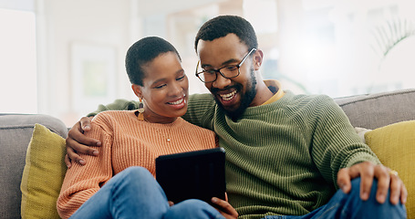 Image showing Happy, home tablet and relax black couple reading, smile or watch social media video, blog or relationship news. Happiness, lounge sofa and African man, woman or marriage people check online website