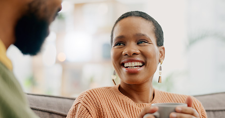 Image showing Coffee, conversation and happy woman at home on a living room sofa with a man and hot drink. Couple, tea and smile with communication and conversation together with love and support on a couch