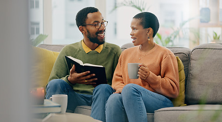 Image showing Coffee, reading and happy couple at home on a living room sofa with a man and hot drink. Book, tea and smile with communication and relax conversation together with love and support on a couch