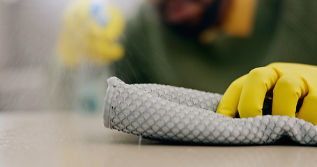 Image showing Cleaning, cloth on surface and hands with furniture in living room for hygiene, housework and maintenance. Housekeeping, closeup and person with gloves on table for bacteria, dirt and dust in home