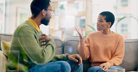 Image showing Conflict, conversation and a black couple with a fight in marriage for relationship stress or problem. House, communication and an African man and woman speaking about a divorce, breakup or mistake