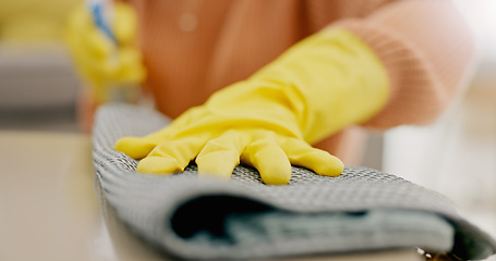 Image showing Cleaning, cloth and hands with furniture in living room for hygiene, housework and maintenance in home. Housekeeping, closeup and person with gloves on table for bacteria, dirt and dust on surface