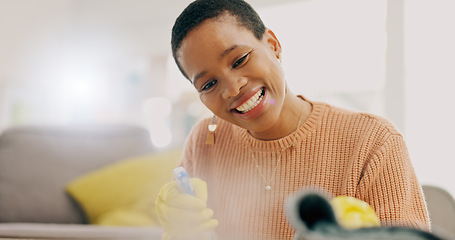 Image showing Cleaning, happy and woman with spray for furniture in living room for hygiene, housework and maintenance. Housekeeping, products and person with gloves for bacteria, dirt and dust on surface in home