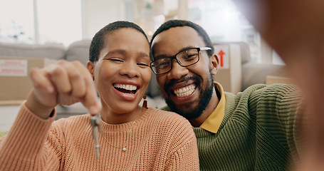 Image showing Black couple, portrait and a selfie with keys in a new home after moving and relocation. Smile, showing and an African man and woman excited with a photo for ownership or buying of a house together