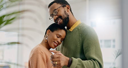 Image showing Home, dancing and black couple with love, hug and romance with lens flare, smile and celebration. Romantic, man and woman with energy, relationship and embrace with support, anniversary and marriage