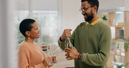 Image showing African couple, glasses and champagne in home with smile, celebration and party for success in living room. Black woman, man and bottle of sparkling wine for achievement, goals and drink in house