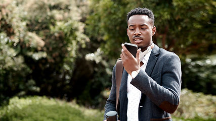 Image showing Nothing keeps you connected to clients like open communication. a young businessman using a smartphone against an urban background.