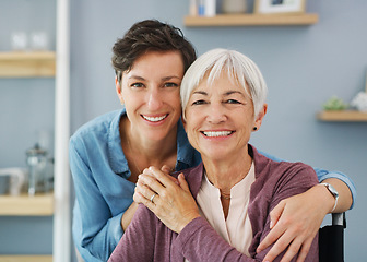 Image showing I draw strength from my daughter. Cropped portrait of an attractive young woman hugging her happy senior mother while at home.