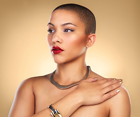 Image showing Youre a Queen and its time for everyone to know it. Studio shot of a beautiful young woman posing against a brown background.