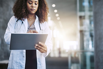 Image showing Ill have to get a second opinion from the best. a female doctor using a digital tablet.