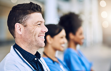 Image showing Were focused on getting you better. Defocused shot of a group of medical practitioners standing together.