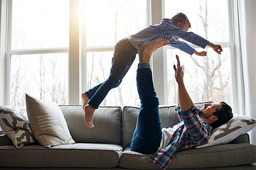 Image showing Its turning out to be a fun-filled day. a father and his little son having fun at home.