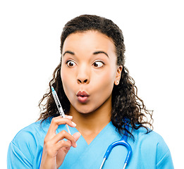 Image showing This should cure it all. a young female doctor ready to inject a patient against a studio background.