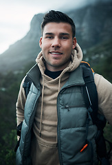 Image showing Seeking adventure is always on my to-do list. Portrait of a young man hiking through the mountains.