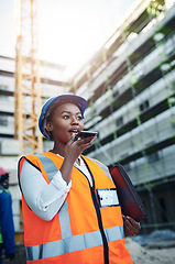 Image showing A smart building contractor uses smart tools. a young woman using a smartphone while working at a construction site.