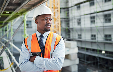 Image showing Quality levels thats as high as their buildings. a confident young man working at a construction site.