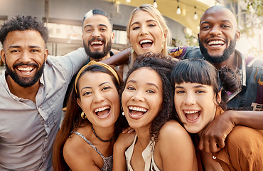 Image showing Special times with incredible people. a group of young friends taking selfies together at a restaurant.