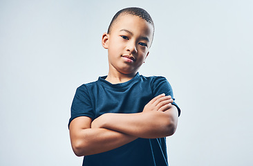 Image showing Im the coolest kid youll ever meet. Studio shot of a cute little boy posing confidently against a grey background.