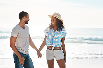 Image showing Talk about a perfect day. a young couple enjoying some quality time together at the beach.