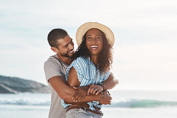 Image showing Loving you comes so easy. a young couple enjoying some quality time together at the beach.