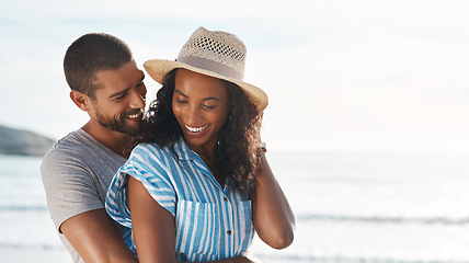 Image showing Your love brightens all my days. a young couple enjoying some quality time together at the beach.