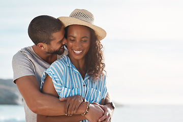 Image showing I promise to love you endlessly. a young couple enjoying some quality time together at the beach.